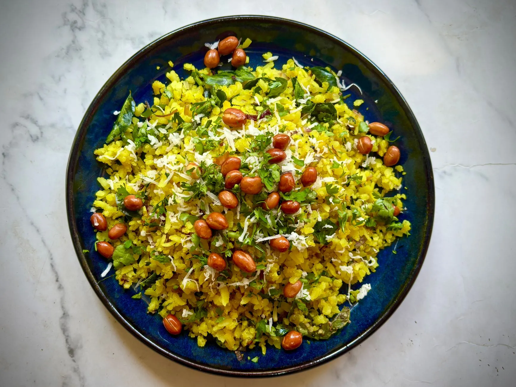 Authentic Maharashtrian Thalicha Poha with Naral Vadi
